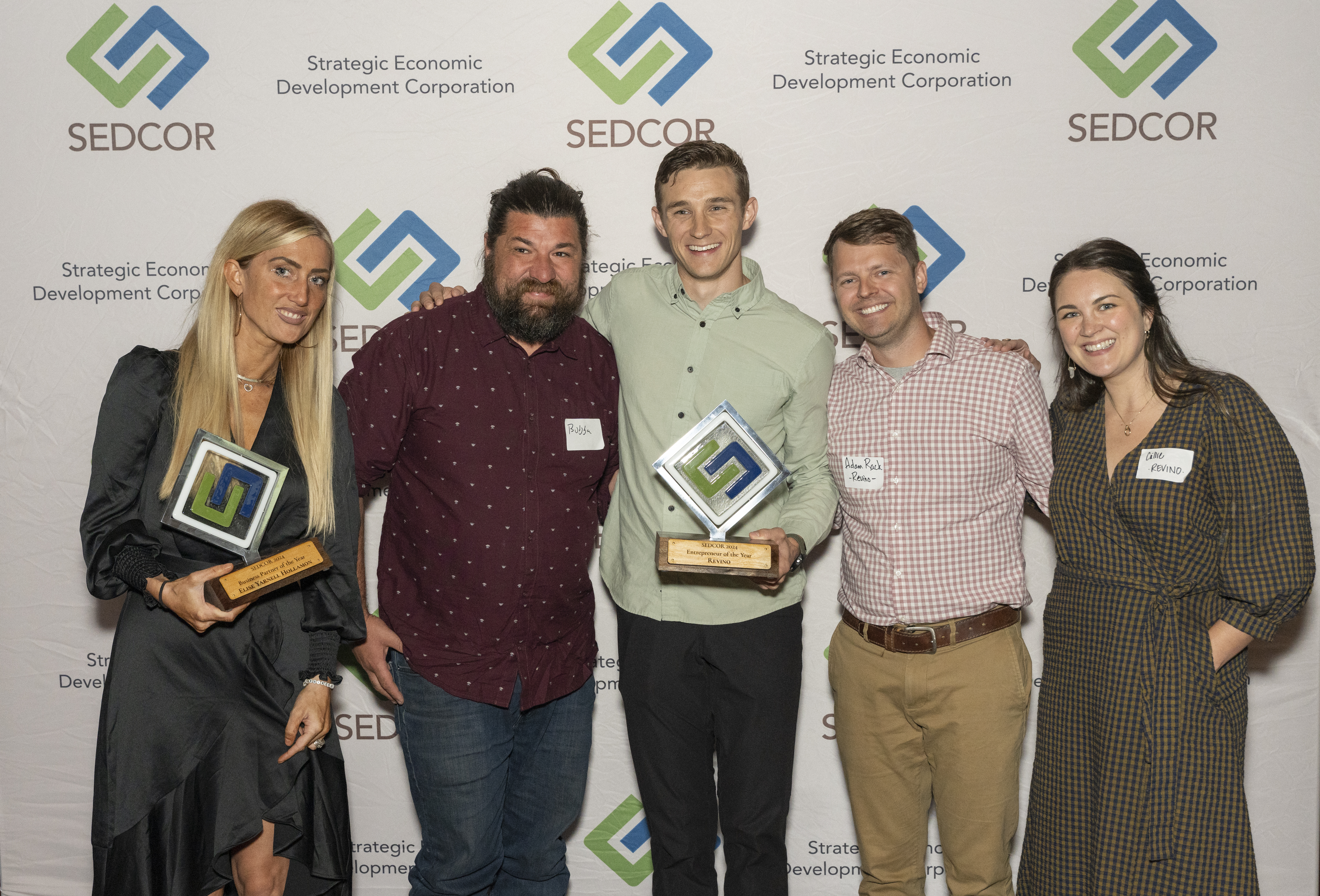 (left to right) Elise Yarnell Hollamon, Bubba King, Keenan O'Hern, Adam Rack collecting their SEDCOR awards in 2024