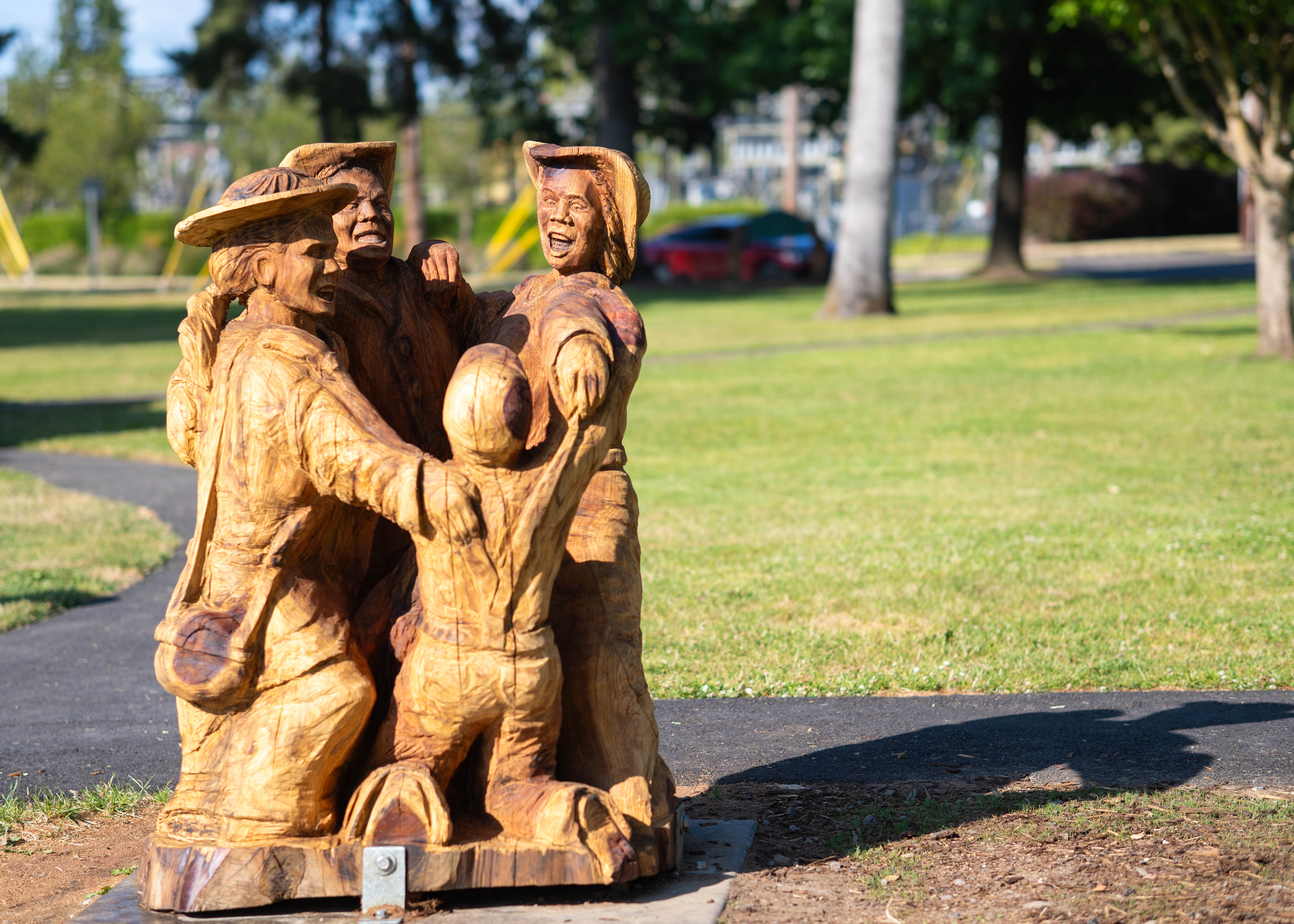 The new Memorial Park sculpture titled "Memoir of a Redwood" created by Stonebender Creations, unveiled in June 2025. Photo: Branden Andersen / Newsberg